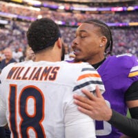 Nov 16, 2025; Minneapolis, Minnesota, USA; Chicago Bears quarterback Caleb Williams (18) greets Minnesota Vikings wide receiver Justin Jefferson (18) following a game at U.S. Bank Stadium.