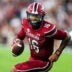 Nov 22, 2025; Columbia, South Carolina, USA; South Carolina Gamecocks quarterback Lanorris Sellers (16) scrambles against the Coastal Carolina Chanticleers in the second quarter at Williams-Brice Stadium.