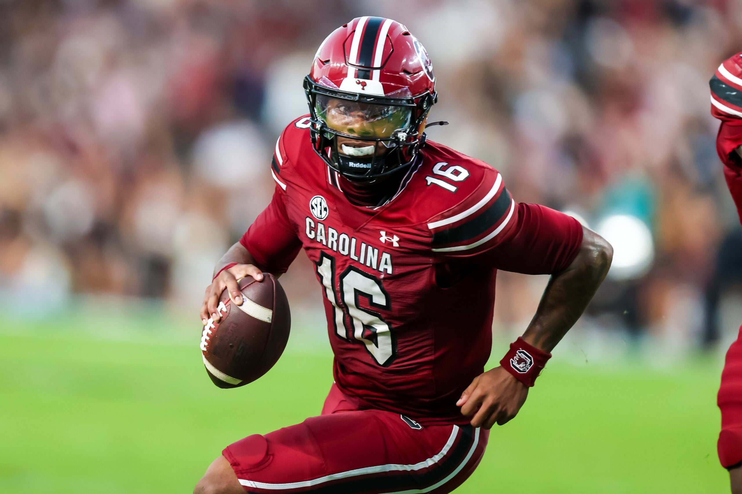 Nov 22, 2025; Columbia, South Carolina, USA; South Carolina Gamecocks quarterback Lanorris Sellers (16) scrambles against the Coastal Carolina Chanticleers in the second quarter at Williams-Brice Stadium.