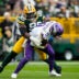 Nov 23, 2025; Green Bay, Wisconsin, USA; Minnesota Vikings quarterback J.J. McCarthy (9) is sacked by. Green Bay Packers defensive tackle Devonte Wyatt (95) during the second half at Lambeau Field.