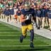 Nov 22, 2025; South Bend, Indiana, USA; Notre Dame Fighting Irish safety Luke Talich (28) returns a blocked kick for a touchdown against the Syracuse Orange during the first half at Notre Dame Stadium.