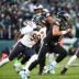 Nov 28, 2025; Philadelphia, Pennsylvania, USA; Philadelphia Eagles quarterback Jalen Hurts (1) scrambles with the ball defended by Chicago Bears defensive end Montez Sweat (98) during the first quarter of the game at Lincoln Financial Field.