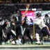 Nov 28, 2025; Philadelphia, Pennsylvania, USA; Philadelphia Eagles quarterback Jalen Hurts (1) passes the ball under pressure by Chicago Bears defensive end Montez Sweat (98) during the third quarter of the game at Lincoln Financial Field.