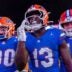 Nov 29, 2025; Gainesville, Florida, USA; Florida Gators running back Jadan Baugh (13) celebrates his touchdown during the fourth quarter against the Florida State Seminoles at Ben Hill Griffin Stadium.