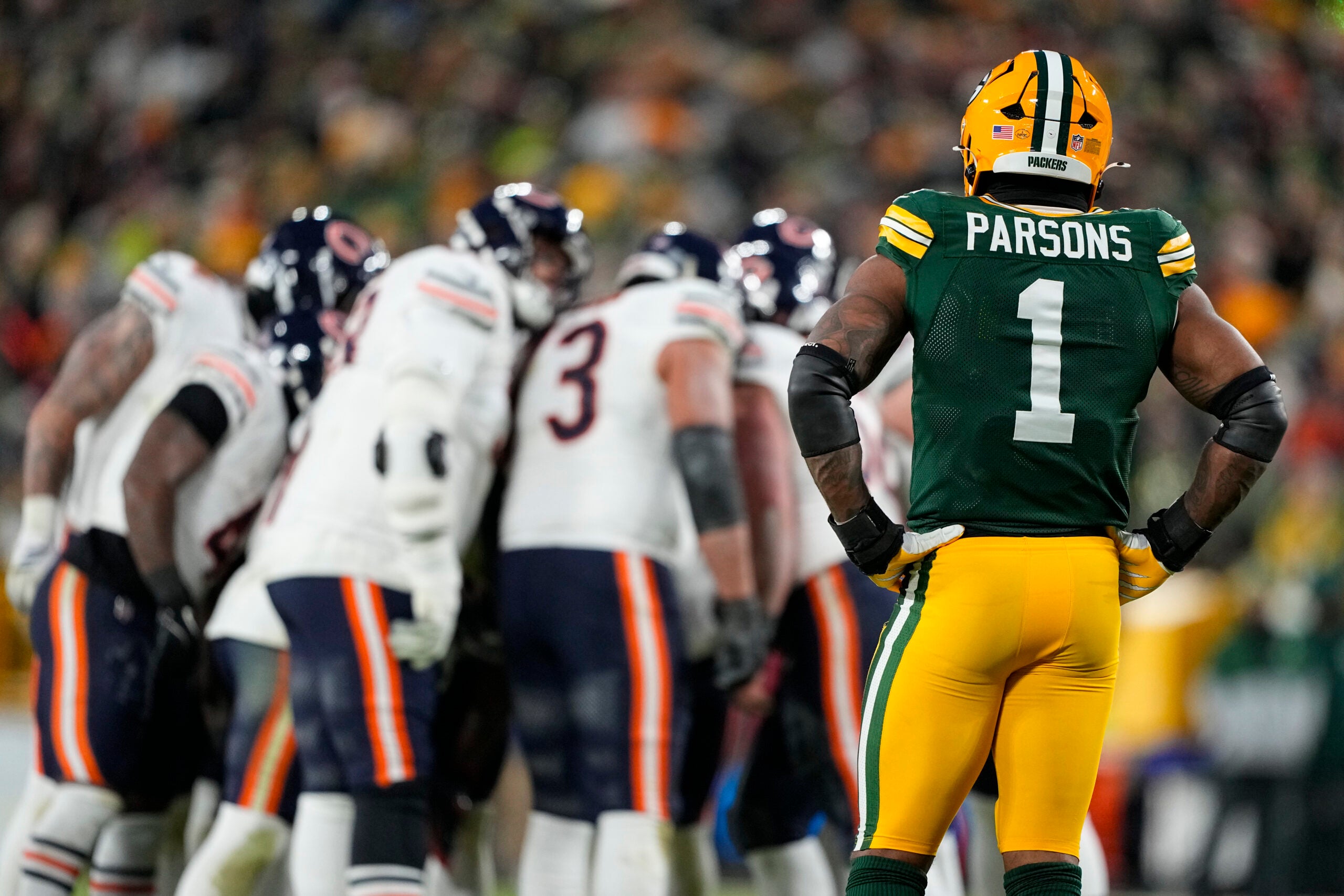 Dec 7, 2025; Green Bay, Wisconsin, USA; Green Bay Packers defensive end Micah Parsons (1) looks on during the game against the Chicago Bears at Lambeau Field.