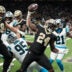 Dec 14, 2025; New Orleans, Louisiana, USA; New Orleans Saints running back Devin Neal (24) reacts after scoring a touchdown during the second quarter against the Carolina Panthers at Caesars Superdome.