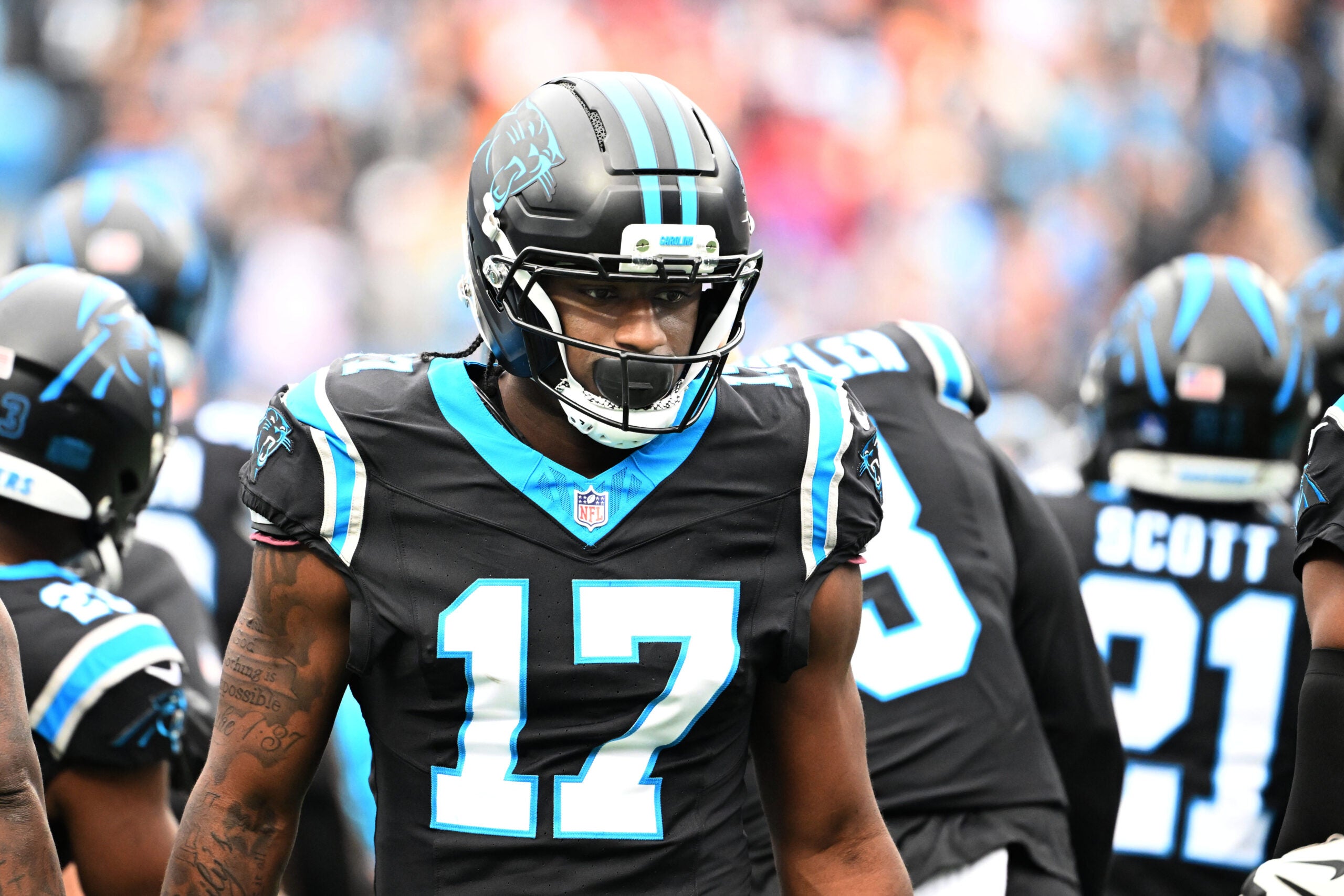 Dec 21, 2025; Charlotte, North Carolina, USA; Carolina Panthers wide receiver Xavier Legette (17) runs on to the field before the game at Bank of America Stadium.