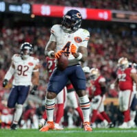 Dec 28, 2025; Santa Clara, California, USA; Chicago Bears running back D'Andre Swift (4) celebrates after scoring a touchdown against the San Francisco 49ers in the second half at Levi's Stadium.
