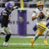 Jan 4, 2026; Minneapolis, Minnesota, USA; Green Bay Packers quarterback Clayton Tune (6) runs the ball past Minnesota Vikings defensive tackle Jalen Redmond (61) during the third quarter at U.S. Bank Stadium.