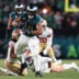 Jan 11, 2026; Philadelphia, PA, USA; San Francisco 49ers linebacker Eric Kendricks (43) tackles Philadelphia Eagles running back Saquon Barkley (26) during the second quarter in an NFC Wild Card Round game at Lincoln Financial Field.