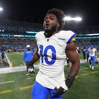 Jan 10, 2026; Charlotte, NC, USA; Los Angeles Rams outside linbacker Josaiah Stewart (10) runa off the field after the NFC Wild Card Round game at Bank of America Stadium.