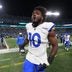 Jan 10, 2026; Charlotte, NC, USA; Los Angeles Rams outside linbacker Josaiah Stewart (10) runa off the field after the NFC Wild Card Round game at Bank of America Stadium.