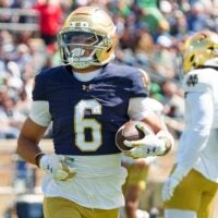 Notre Dame wide receiver Jordan Faison (6) runs the ball during the Blue-Gold spring game at Notre Dame Stadium on Saturday, April 25, 2026, in South Bend.