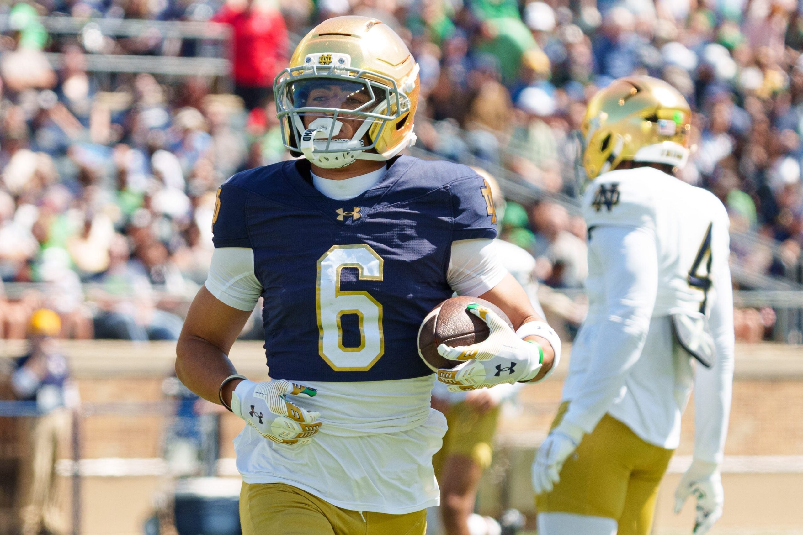 Notre Dame wide receiver Jordan Faison (6) runs the ball during the Blue-Gold spring game at Notre Dame Stadium on Saturday, April 25, 2026, in South Bend.