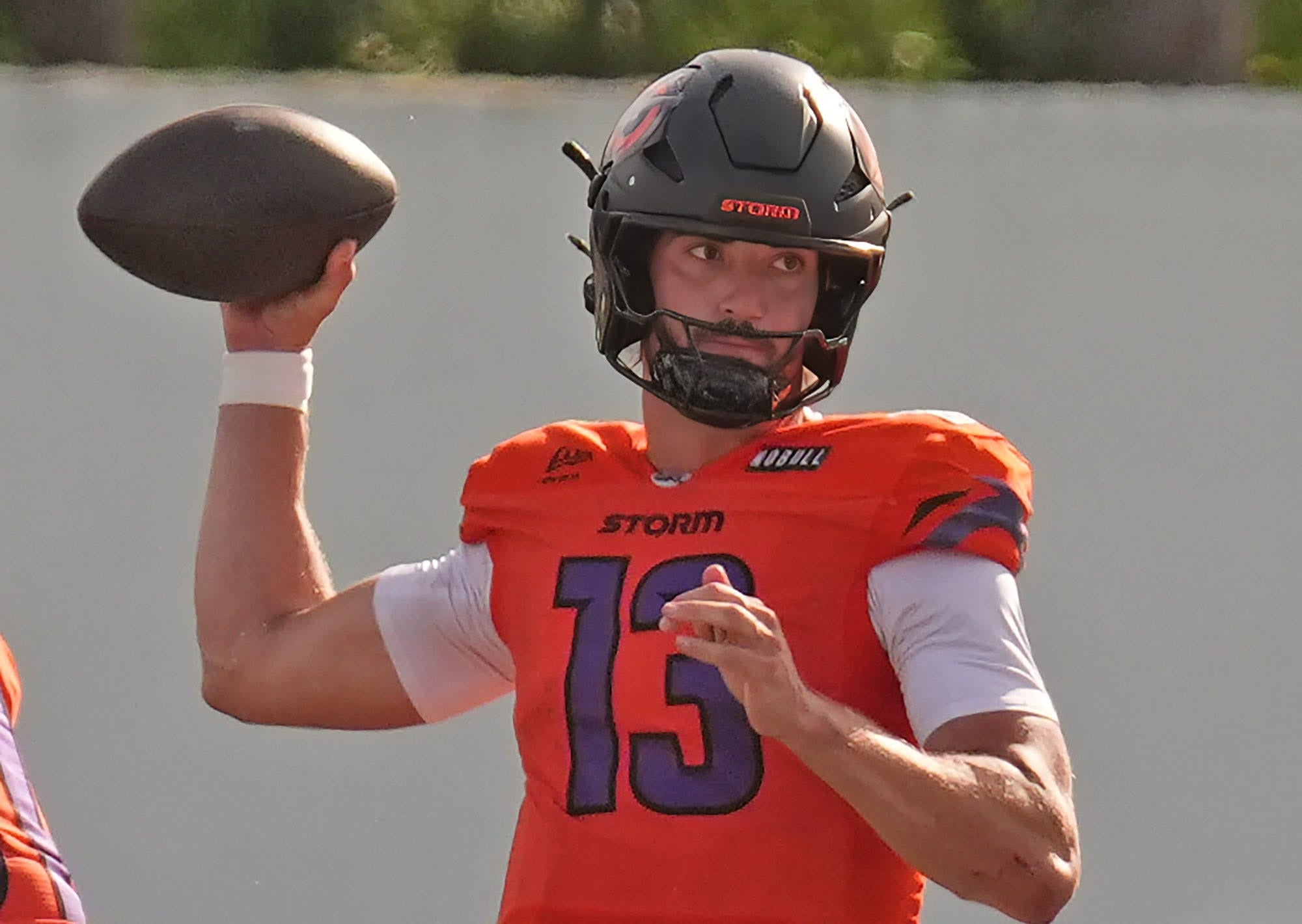 Orlando Storm quarterback Jack Plummer (13) looks for an open receiver during the UFL playoff game against the DC Defenders at Daytona Stadium on June 7, 2026.