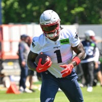 Jun 9, 2026; Foxborough, MA, USA; New England Patriots wide receiver A.J. Brown (1) runs after the catch at minicamp at Gillette Stadium.