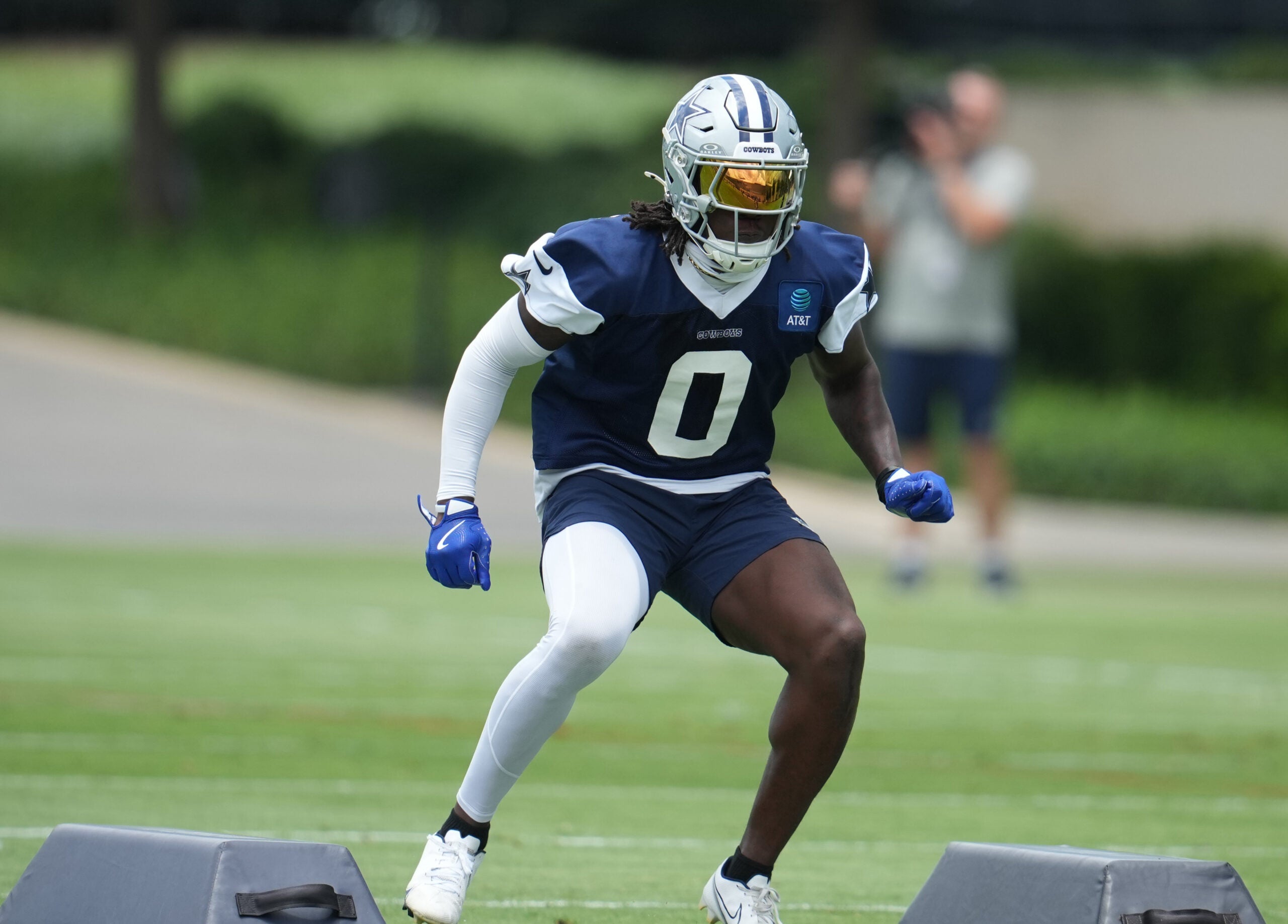 Jun 16, 2026; Dallas, TX, USA; Dallas Cowboys linebacker DeMarvion Overshown (0) goes through a drill during practice at the Ford Center at the Star Training Facility in Frisco, Texas.