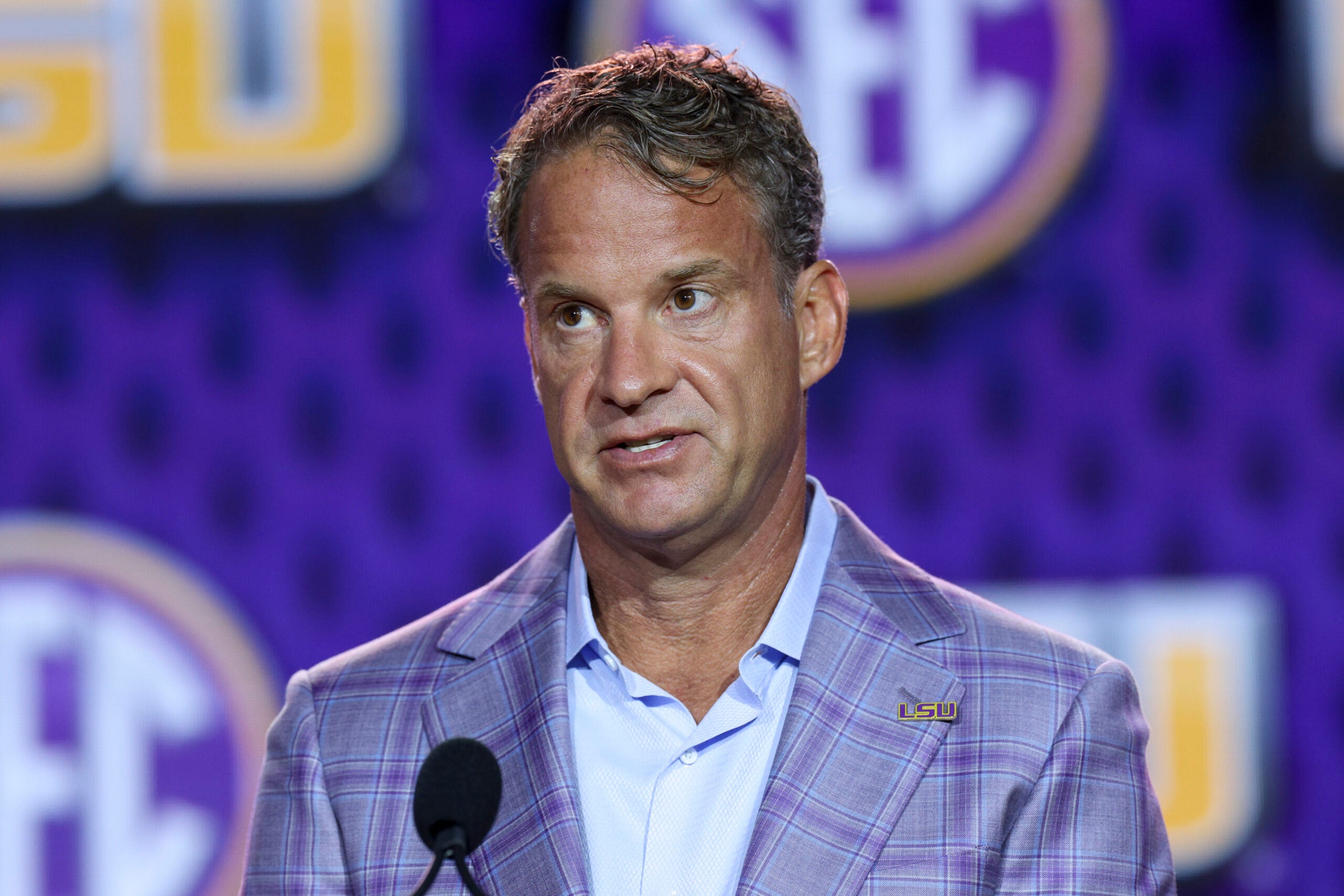 Jul 23, 2026; Tampa, FL, USA; LSU Tigers head coach Lane Kiffin speaks to the press during SEC Football Kickoff Media Day at the Tampa Marriott.