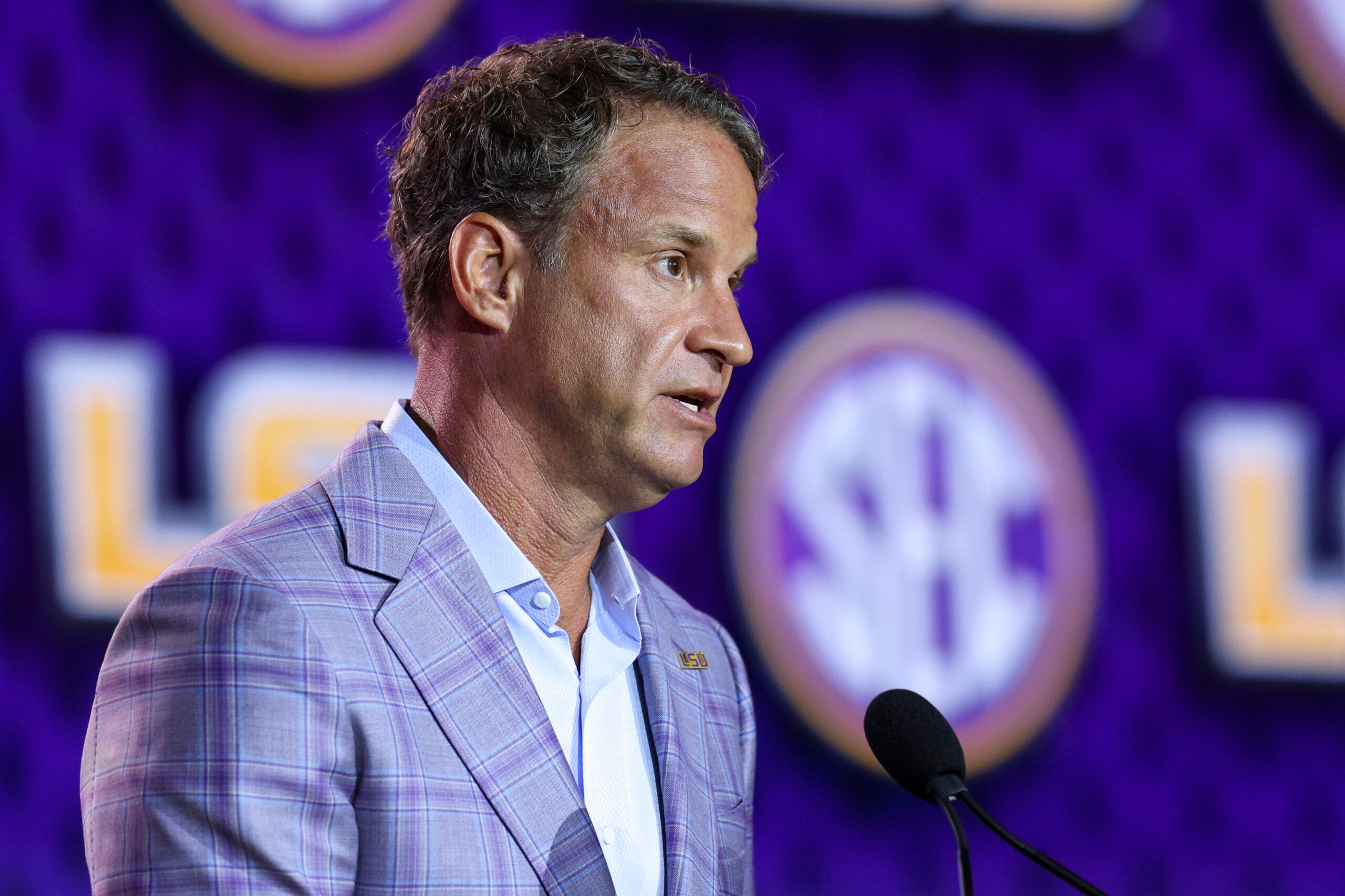 Jul 23, 2026; Tampa, FL, USA; LSU Tigers head coach Lane Kiffin speaks to the press during SEC Football Kickoff Media Day at the Tampa Marriott.