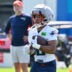 Jul 25, 2026; Foxborough, MA, USA; New England Patriots running back Treveyon Henderson (32) runs with the ball at training camp at Gillette Stadium.