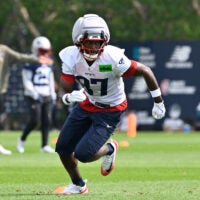 Jul 28, 2026; Foxborough, MA, USA; New England Patriots wide receiver Romeo Doubs (87) does a drill during training camp at Gillette Stadium.