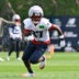 Jul 28, 2026; Foxborough, MA, USA; New England Patriots wide receiver Romeo Doubs (87) does a drill during training camp at Gillette Stadium.