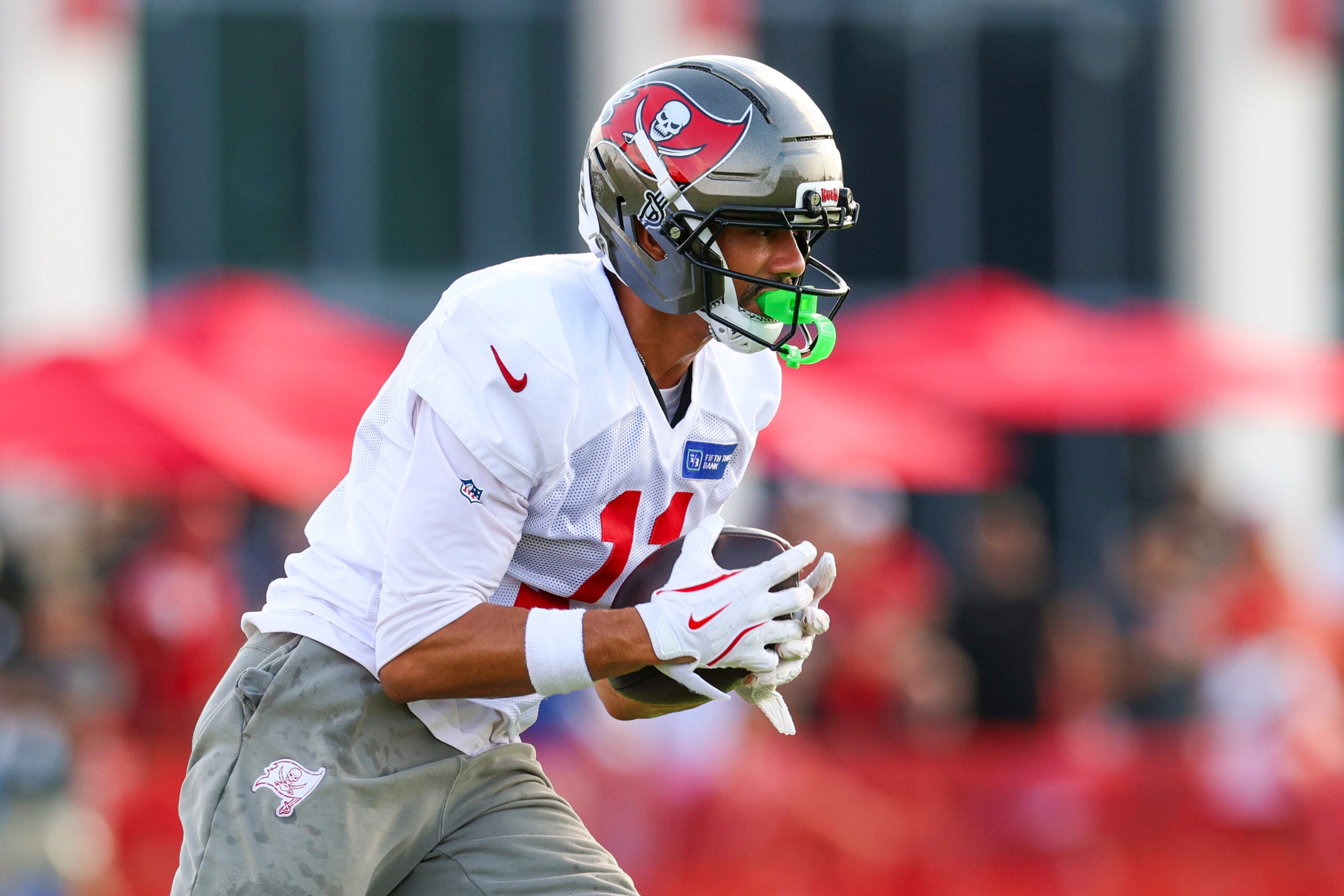 Jalen McMillan will miss another large chunk of an NFL season after injuring his knee against the Vikings.