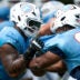 Tennessee Titans tackle JC Latham (55) and tackle Aamil Wagner (69) go through drills during minicamp at Vanderbilt Health Football Center Tuesday, Aug. 4, 2026.