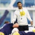 Head coach Marcus Freeman greets his players during a Notre Dame football practice at Irish Athletic Center on Friday, March 20, 2026, in South Bend.