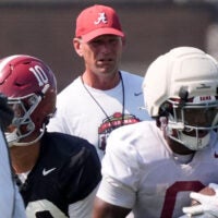 Aug. 6, 2026; Tuscaloosa, AL, USA; Head coach Kalen DeBoer watches the quarterbacks and running backs during the Alabama Crimson Tide's first open practice session.