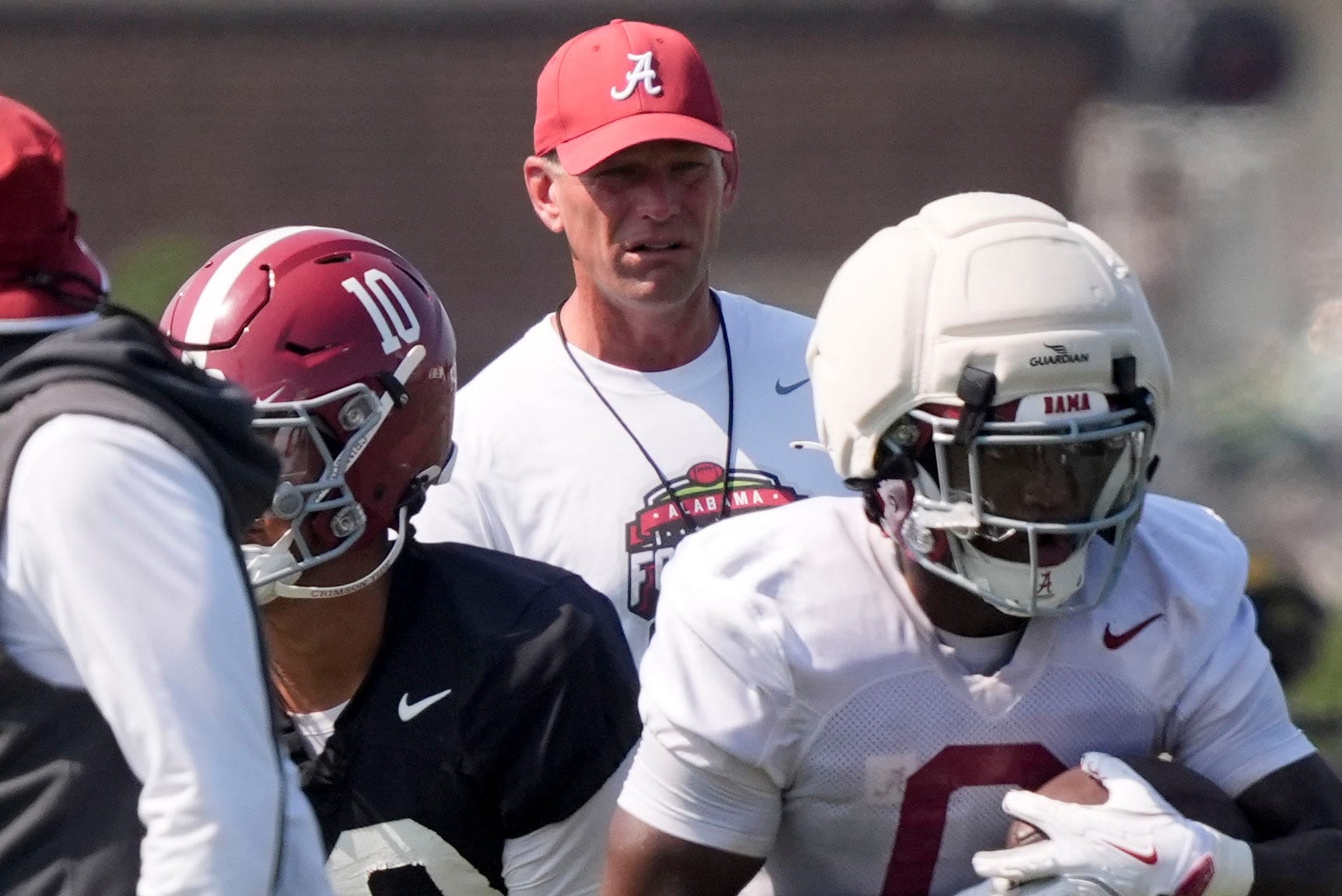 Aug. 6, 2026; Tuscaloosa, AL, USA; Head coach Kalen DeBoer watches the quarterbacks and running backs during the Alabama Crimson Tide's first open practice session.