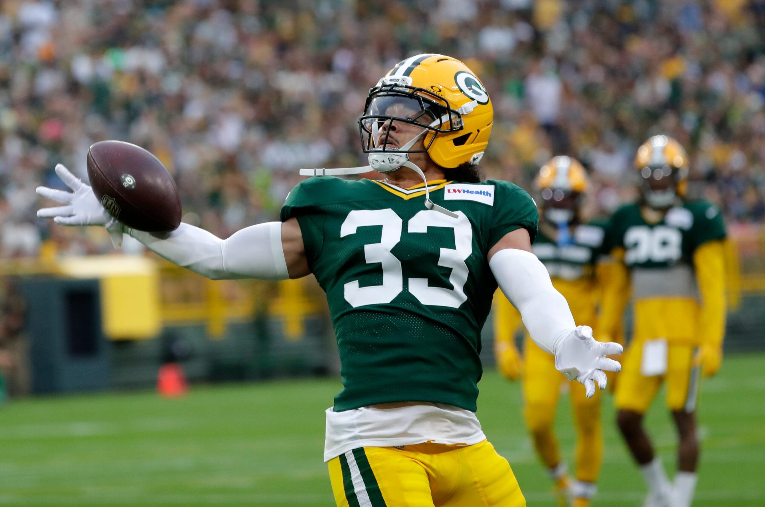 Green Bay Packers safety Evan Williams (33) tries to catch the ball during Green Bay Packers Family Night on Aug. 7, 2026, at Lambeau Field in Green Bay, Wis.