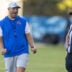 Florida Head Coach Jon Sumrall, left, watches practice with referees at Heavener Football Complex in Gainesville, FL on Tuesday, August 11, 2026.