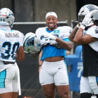 Aug 4, 2026; Charlotte, NC, USA; Carolina Panthers running back Chuba Hubbard (30), running back AJ Dillon (28) and running back Jonathon Brooks (25) during training camp at Bank of America Stadium.