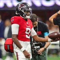 Aug 14, 2026; Atlanta, Georgia, USA; Atlanta Falcons quarterback Michael Penix Jr. (9) warms up before a game against the Denver Broncos at Mercedes-Benz Stadium.