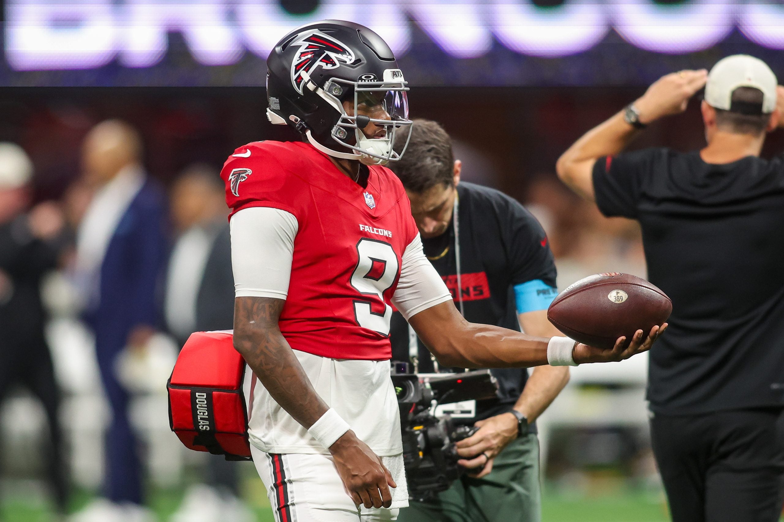 Aug 14, 2026; Atlanta, Georgia, USA; Atlanta Falcons quarterback Michael Penix Jr. (9) warms up before a game against the Denver Broncos at Mercedes-Benz Stadium.