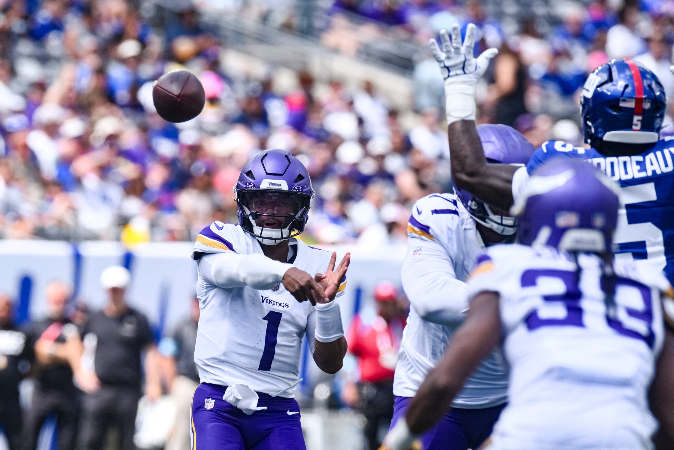 Aug 15, 2026; East Rutherford, New Jersey, USA; Minnesota Vikings quarterback Kyler Murray (1) passes the ball against the New York Giants during the first half at MetLife Stadium.