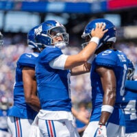 New York Giants quarterback Jaxson Dart (6) celebrates with New York Giants wide receiver Malachi Fields (0) after scoring a touchdown during a preseason opening game between the New York Giants and Minnesota Vikings on Saturday, Aug. 15, 2026, at MetLife Stadium in East Rutherford, NJ.