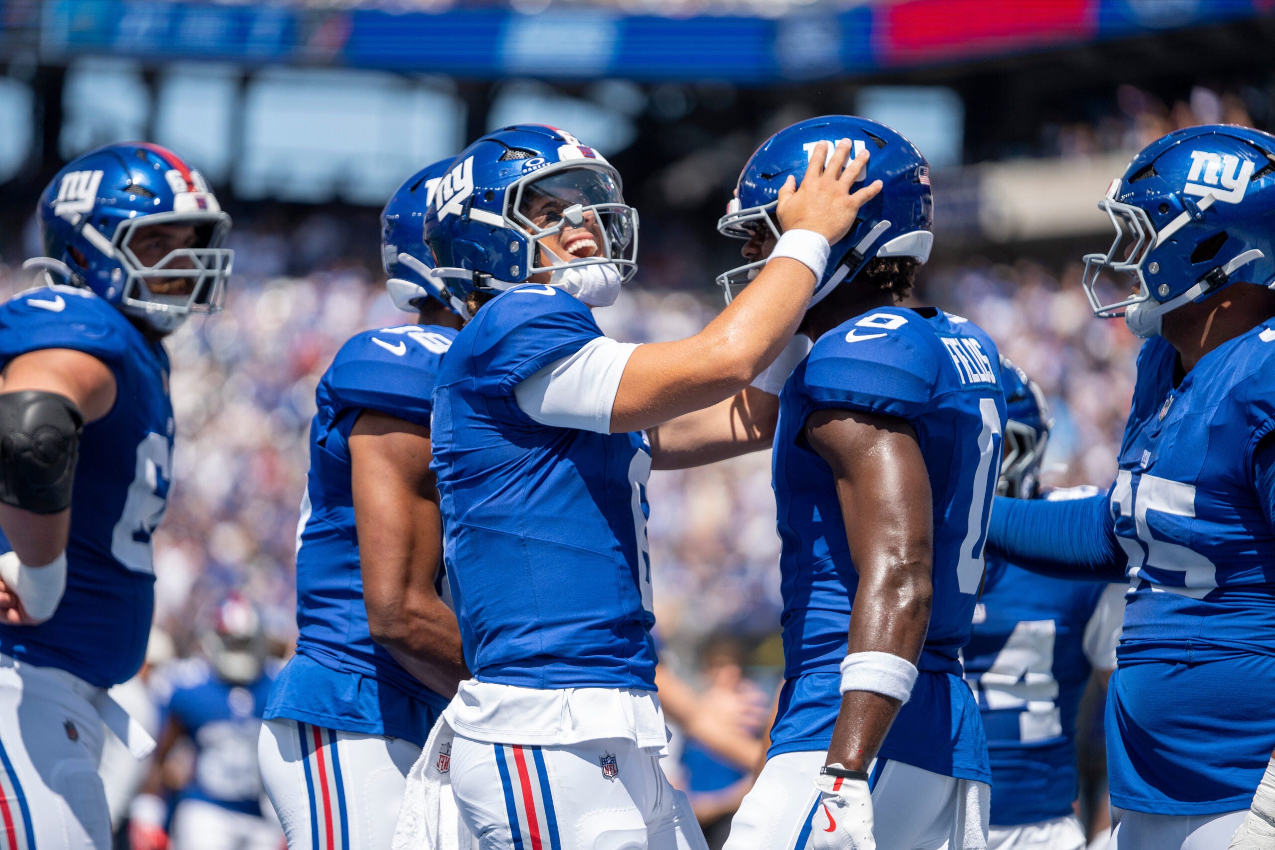 New York Giants quarterback Jaxson Dart (6) celebrates with New York Giants wide receiver Malachi Fields (0) after scoring a touchdown during a preseason opening game between the New York Giants and Minnesota Vikings on Saturday, Aug. 15, 2026, at MetLife Stadium in East Rutherford, NJ.