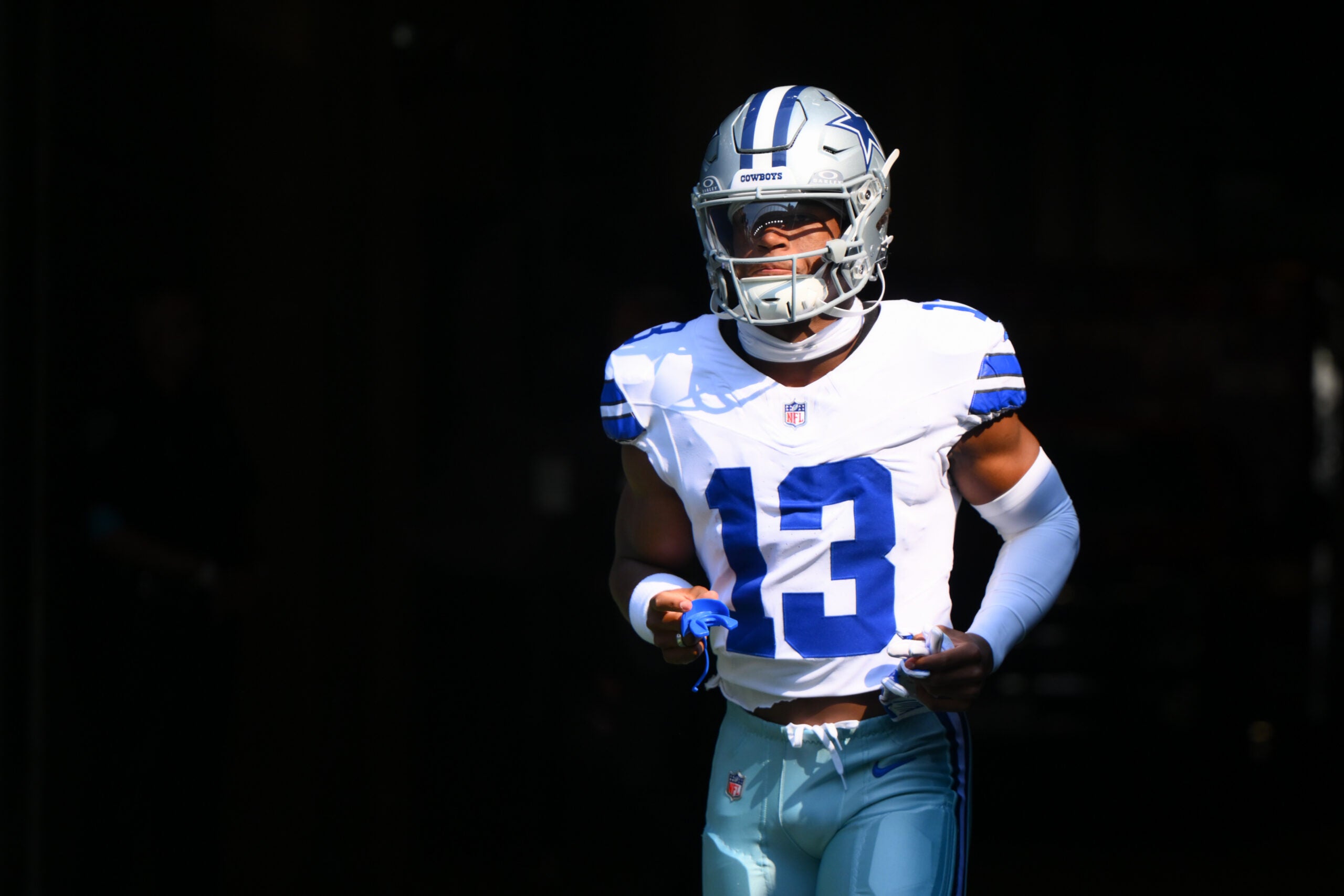 Aug 15, 2026; Seattle, Washington, USA; Dallas Cowboys safety Caleb Downs (13) enters the field before the game against the Seattle Seahawks at Lumen Field.