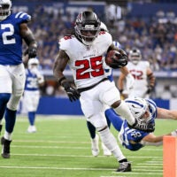 Aug 22, 2026; Indianapolis, Indiana, USA; Atlanta Falcons running back Tyler Goodson (25) runs for a touchdown against the Indianapolis Colts during the first half at Lucas Oil Stadium.