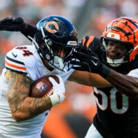 Aug 22, 2026; Cincinnati, Ohio, USA; Chicago Bears tight end Colston Loveland (84) runs with the ball against Cincinnati Bengals linebacker Shaka Heyward (50) in the first half at Paycor Stadium.