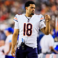 Aug 22, 2026; Cincinnati, Ohio, USA; Chicago Bears quarterback Caleb Williams (18) stands on the sidelines during the second half in the game against the Cincinnati at Paycor Stadium.