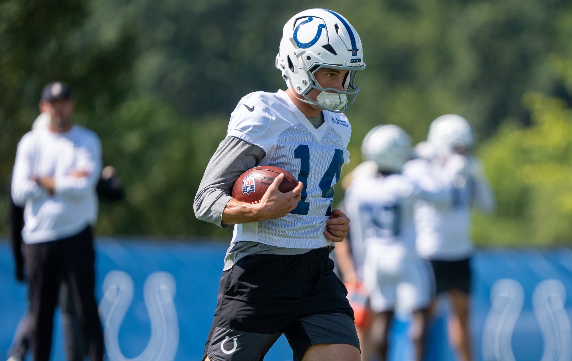 Indianapolis Colts wide receiver Alec Pierce (14) runs downfield after a catch Thursday, Aug. 27, 2026, during practice at Indiana Farm Bureau Football Center.