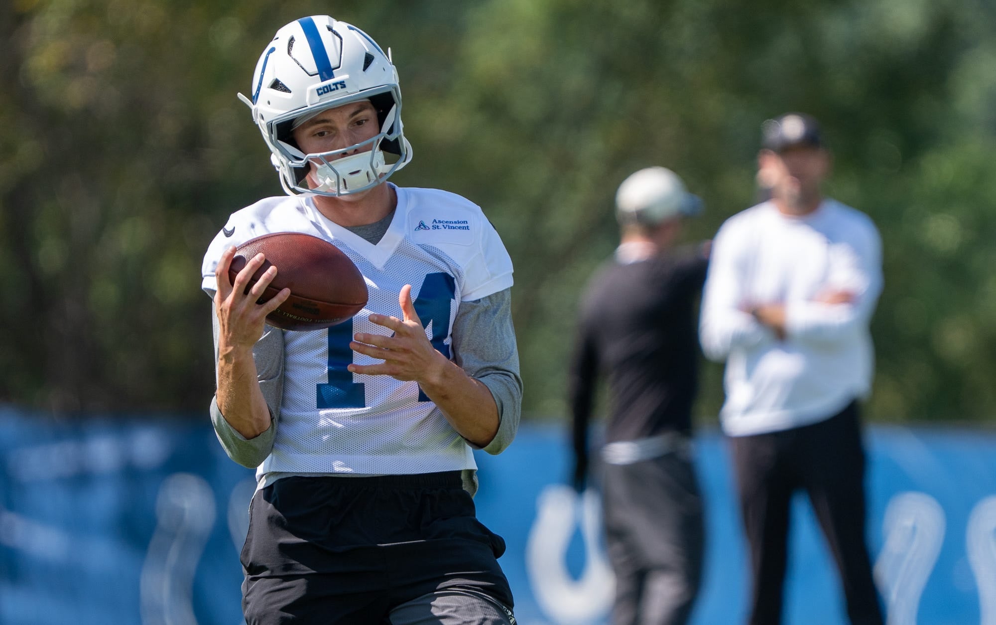 Indianapolis Colts wide receiver Alec Pierce (14) secures a pass Thursday, Aug. 27, 2026, during practice at Indiana Farm Bureau Football Center.