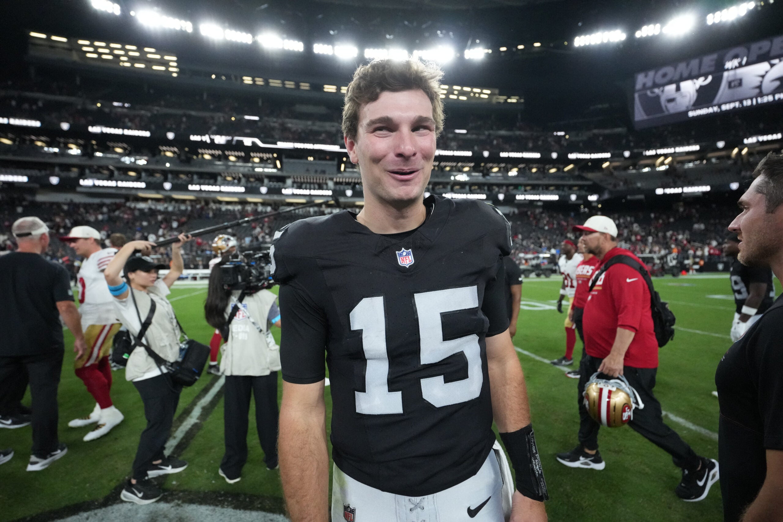 Aug 27, 2026; Paradise, Nevada, USA; Las Vegas Raiders quarterback Fernando Mendoza (15) reacts while walking on the field after a game against the San Francisco 49ers at Allegiant Stadium.