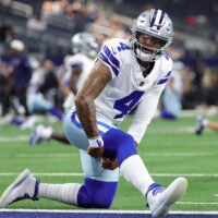 Aug 28, 2026; Arlington, Texas, USA; Dallas Cowboys quarterback Dak Prescott (4) warms up before the game against the New Orleans Saints at AT&T Stadium.