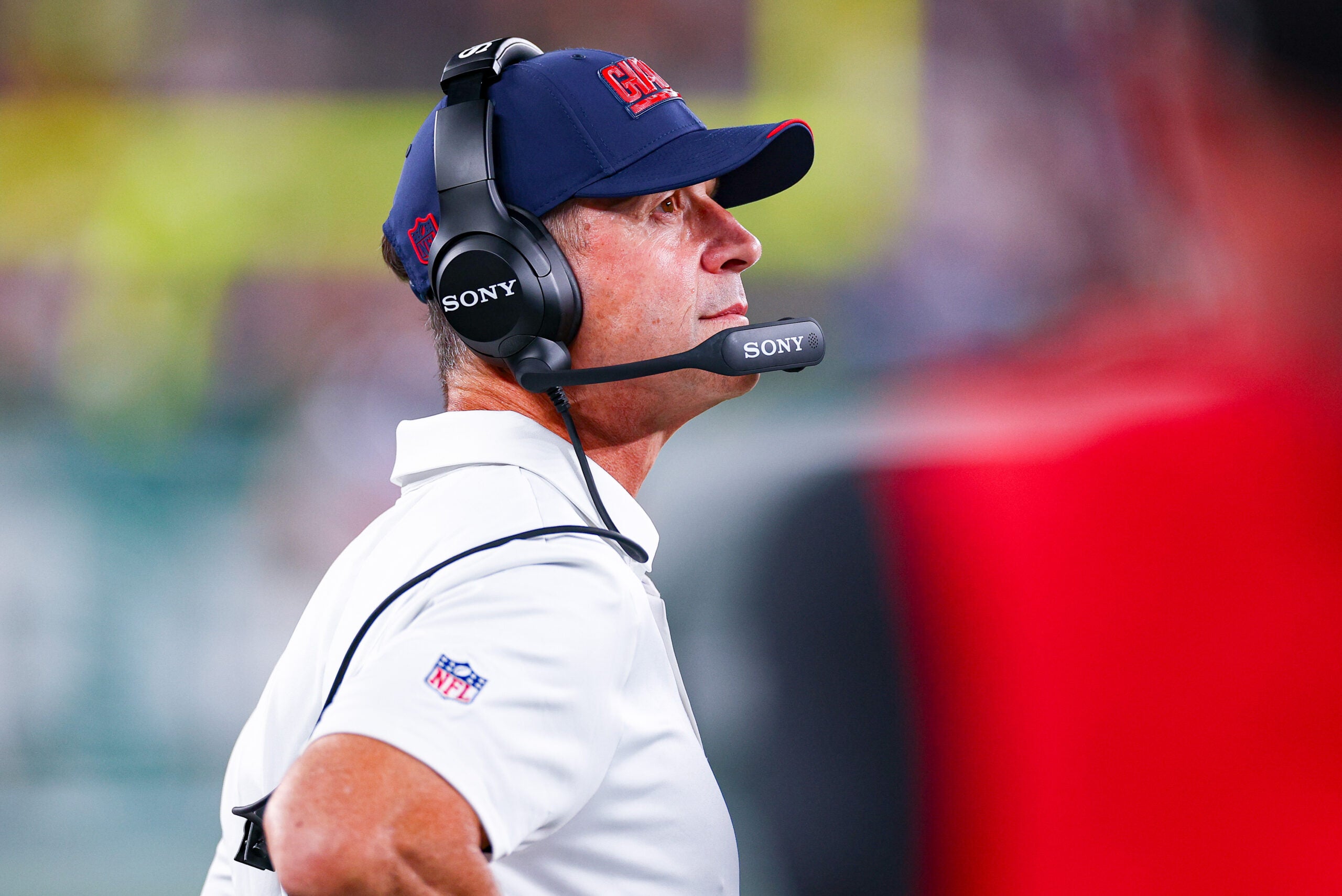 Aug 28, 2026; East Rutherford, New Jersey, USA; New York Giants head coach John Harbaugh looks up during the first half against the New York Jets at MetLife Stadium.