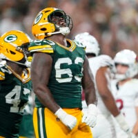 Aug 28, 2026; Green Bay, Wisconsin, USA; Green Bay Packers defensive tackle Jaden Crumedy (63) celebrates following a play during the third quarter against the Arizona Cardinals at Lambeau Field.