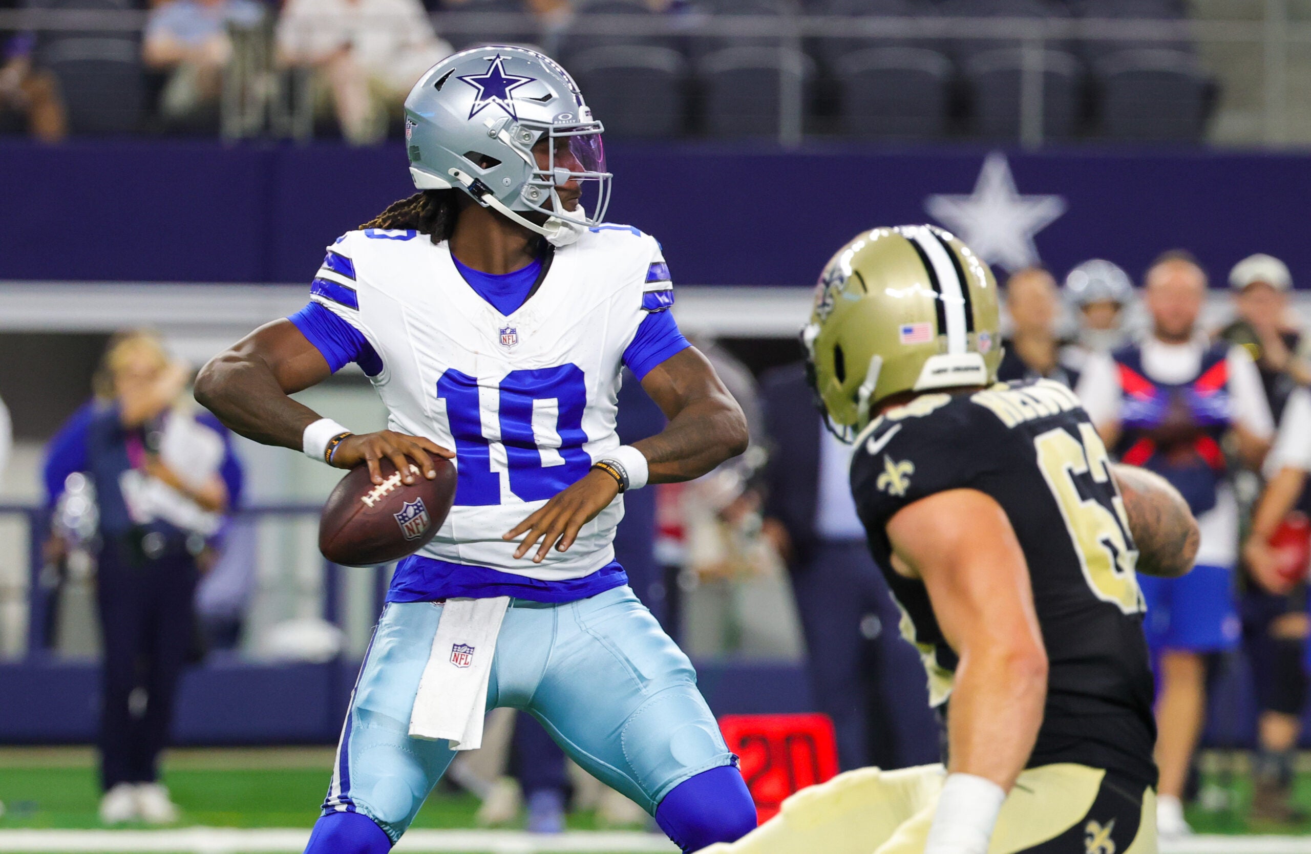 Aug 28, 2026; Arlington, Texas, USA; Dallas Cowboys quarterback Joe Milton III (10) throws past New Orleans Saints defensive end Michael Heldman (63) during the first half at AT&T Stadium.
